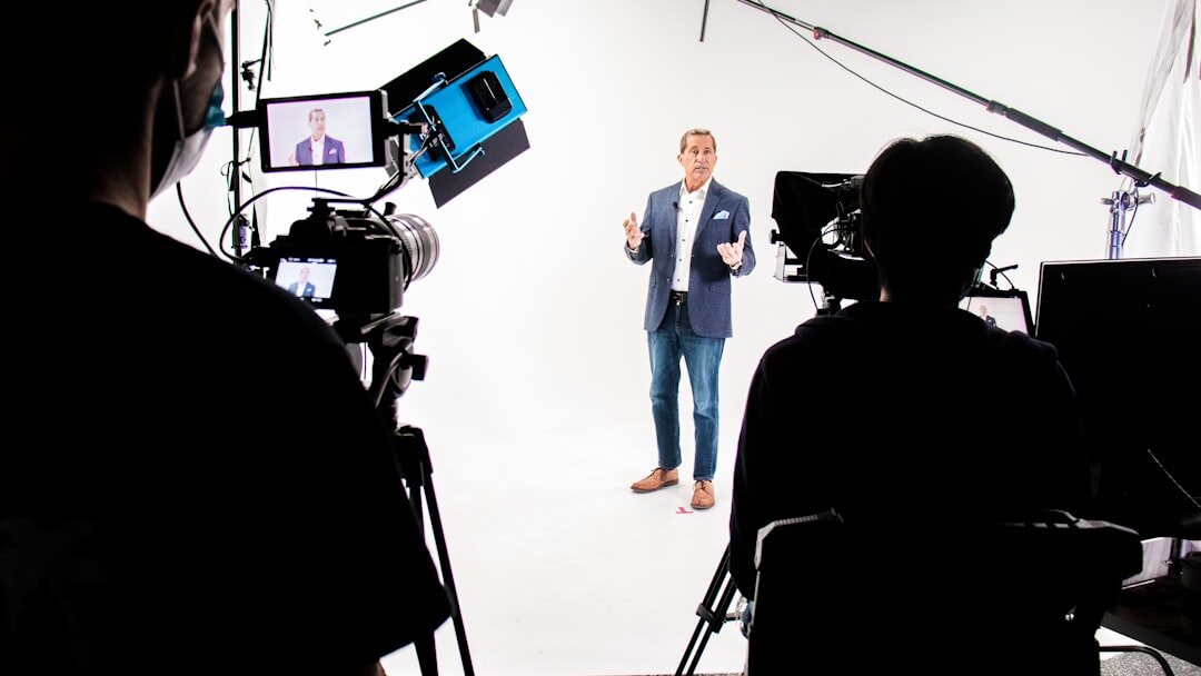 Slovenian business executive being interviewed on camera in a studio